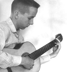 Duncan Ball playing guitar